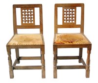 Lot 325 - A pair of Robert "Mouseman" Thompson single dining chairs.