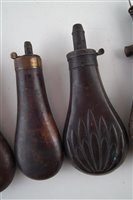 Lot 123 - Four powder flasks and two shot flasks