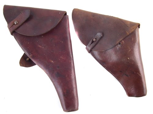 Lot 318 - Two leather revolver holsters