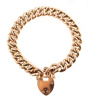 Lot 109 - 15ct gold curb link bracelet with heart-shaped padlock fastener