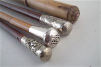 Lot 274 - Four officers swagger sticks including University Public Schools