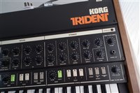 Lot 68 - Korg Trident keyboard and stand, with accessories, together with a Peavey KB-300 Keyboard amplifier