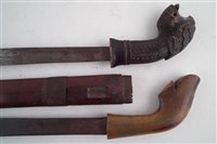 Lot 214 - Two Malay /Indonisian Klewang swords