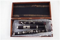 Lot 22 - Ebony flute in wood case