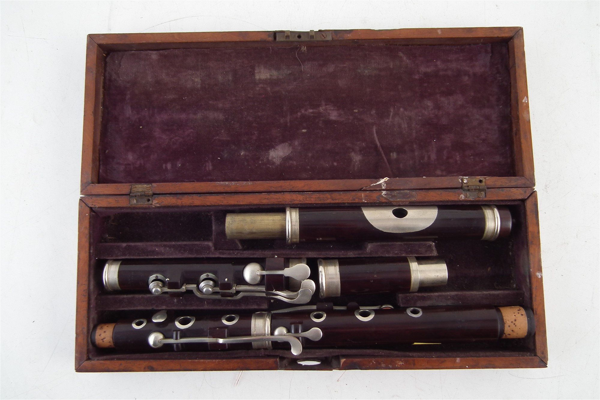 Lot 39 Rosewood flute by J. Wallis London, with