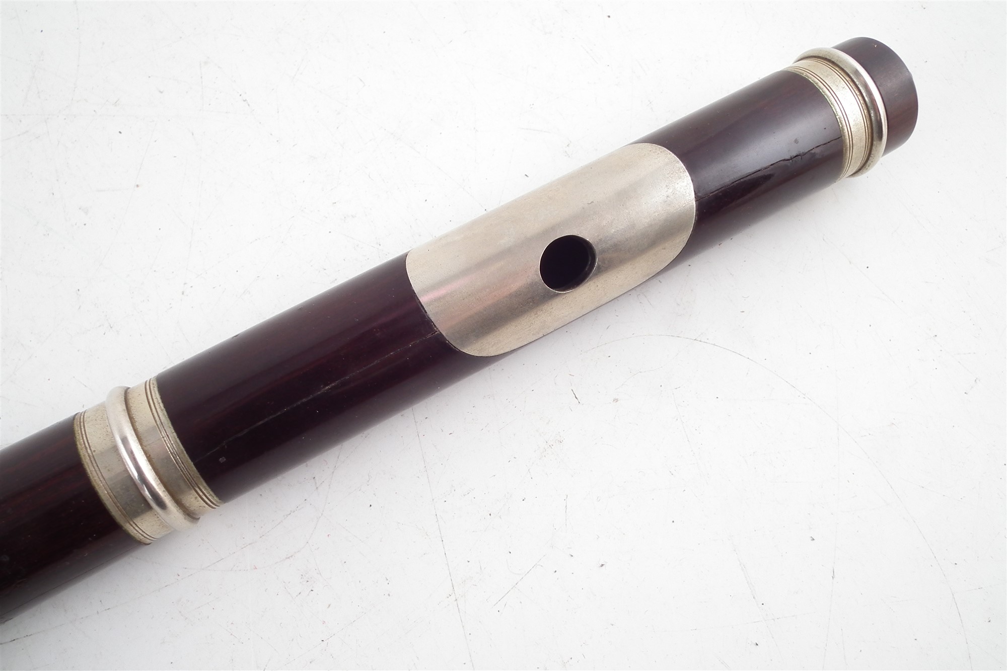 Lot 39 Rosewood flute by J. Wallis London, with