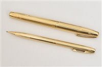 Lot 68 - Sheaffer gold plated fountain pen and pencil set (2).