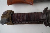 Lot 206 - Collection of militaria to include a U.S. M3 Utica knife and scabbard