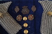 Lot 242 - Cased display containing Duke of Lancaster's cap badges