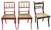 Lot 338 - A pair of Regency style red lacquered single dining chairs and one other.