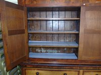 Lot 355 - Early 19th century oak housekeepers cupboards.