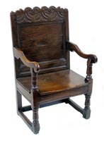 Lot 331 - Mid 18th century oak elbow chair.