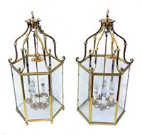 Lot 328 - A pair of brass Regency style hall lanterns.