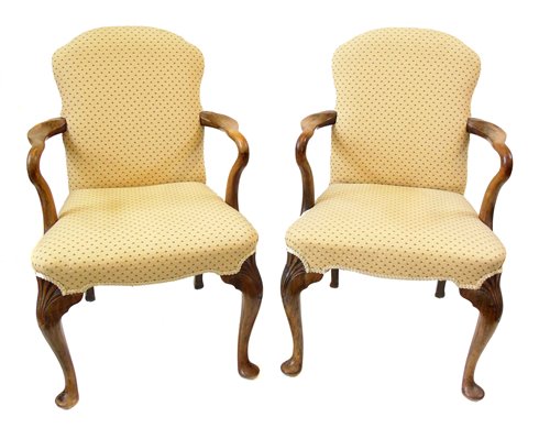 Lot 337 - A pair of 1920's beech open armchairs of Queen Anne style.