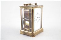 Lot 310 - Late 19th century brass framed carriage clock.