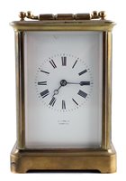 Lot 310 - Late 19th century brass framed carriage clock.