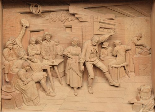 Lot 307 - Ernst Steiner, A Tyrolean interior scene with figures dancing, carved limewood diorama.