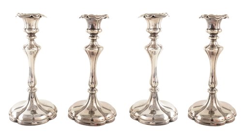 Lot 89 - Four silver plated candlesticks by Elkington & Co