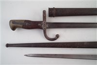 Lot 151 - Two Gras rifle bayonets with scabbards, also two sets of WW1 spurs