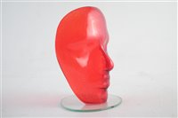 Lot 198 - Red glass face vase