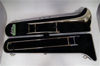 Lot 55 - Blessing Scholastic Trombone, together with a Arbiter Trumpet both with cases