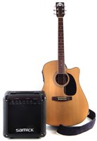 Lot 165 - Delta steel string acoustic guitar with case and practice amp.