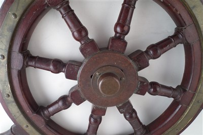 Lot 187 - Mahogany ships wheel, brass boss with eight spokes, diameter, 76cm (30").