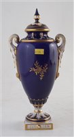 Lot 247 - Royal Worcester twin handled lidded vase