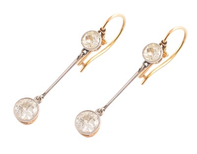 Lot 43 - Pair of diamond 2-stone yellow and white gold drop earrings