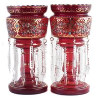 Lot 194 - Pair of Victorian cranberry glass lustres