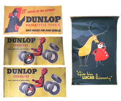 Lot 130 - Three Dunlop Tyre promotion posters and a Christmas poster "Give Him a Lucas Accessory", 76cm (30") x 51cm (20").