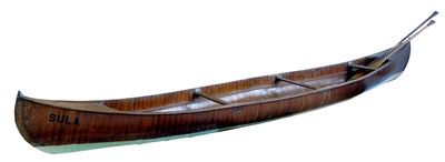 Lot 213 - Canadian design laminate canoe with brass plaque for Chester Boat Company Ltd, 16 foot long with three wooden paddles.