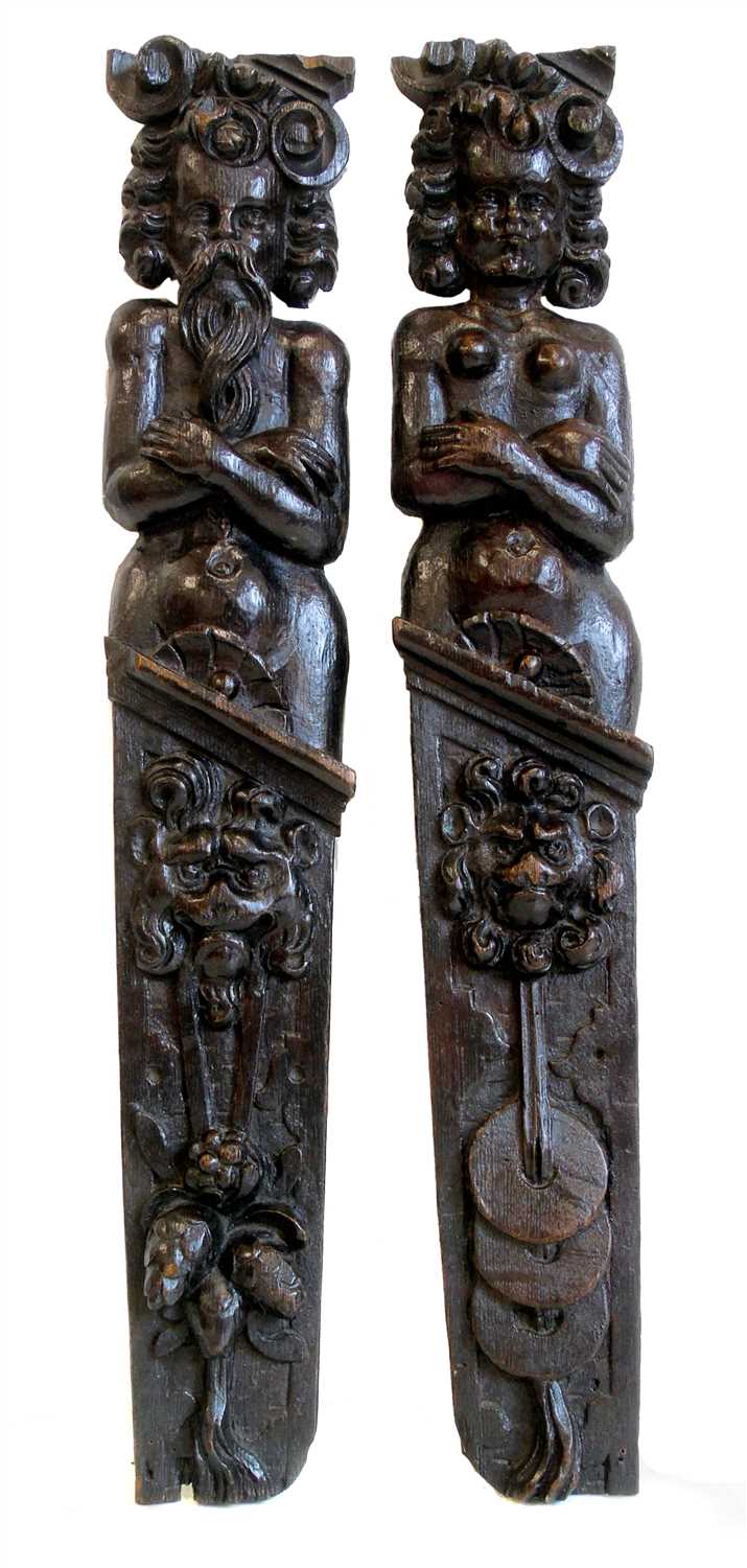 Lot 189 - A pair of 19th century stained oak term pilaster figures