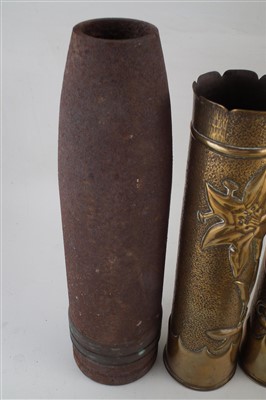 Lot 302 - Five shell cases, bullet head, detonator, two trench art ashtrays and 16th Lancers Horse Brasses.