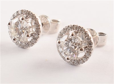 Lot 42 - Pair of diamond 18ct white gold stud earrings