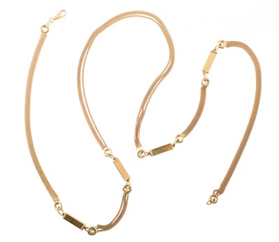 Lot 106 - Three row 9ct gold necklace.