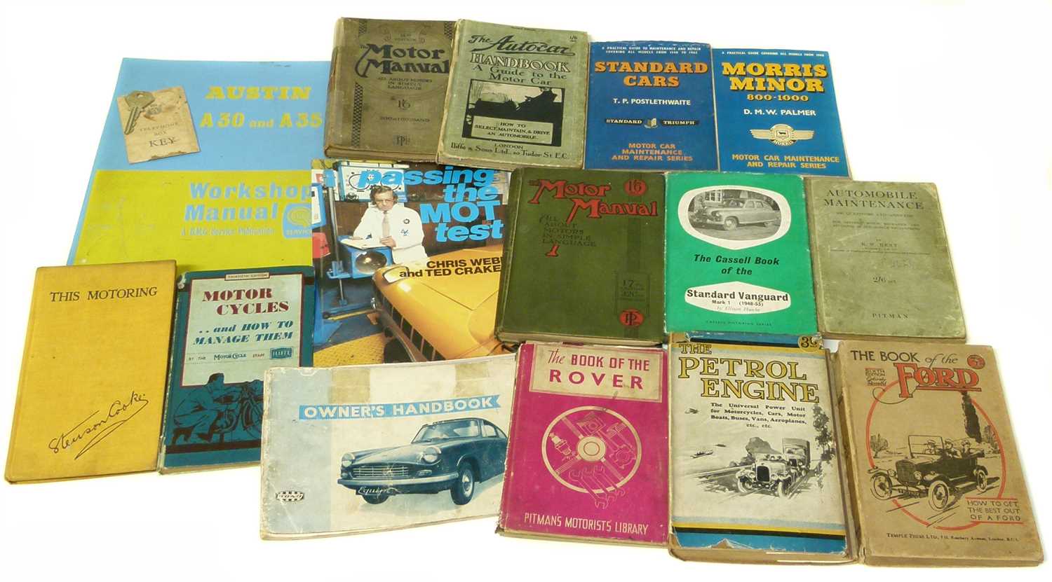 Lot 167 - Small box of automobilia books plus R.A.C Key