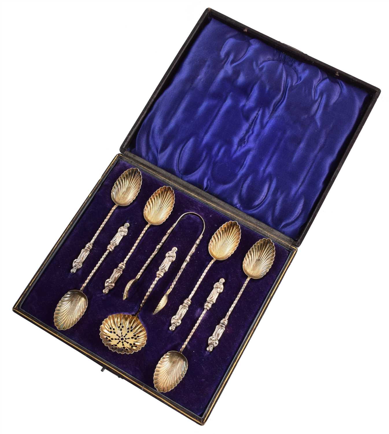 Lot 64 - Boxed set of six silver apostle spoons, tongs and strainer.