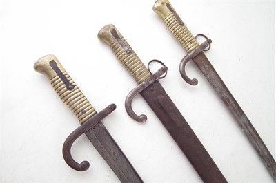 Lot 108 - Three 1866 Chassepot Bayonets, one with scabbard