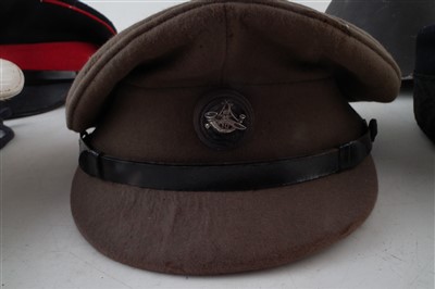 Lot 179 - Collection of uniforms and caps, together with various webbing etc
