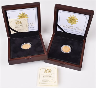 Lot 17 - Two cased 2014 Jersey 22 carat gold proof One Pound coins (2).