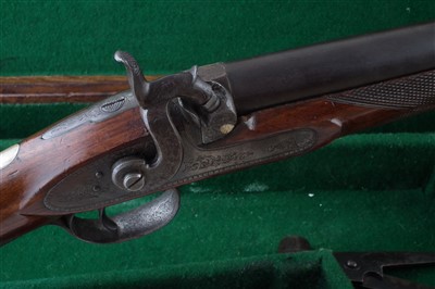 Lot 23 - Percussion sporting gun fitted into a period case