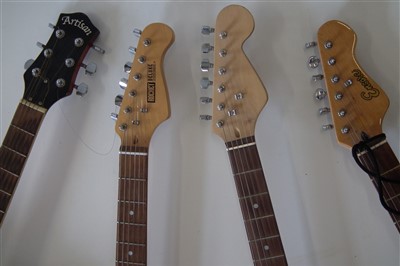 Lot 57 - Three electric guitars and a steel strung acoustic