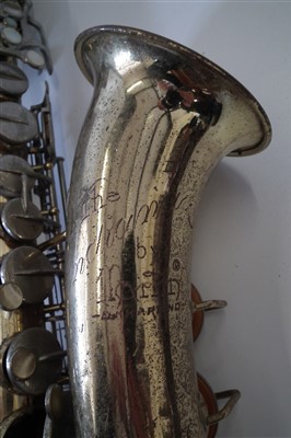 Lot 94 - Godman left hand mandolin,  Indiana by Marlin saxophone and an accordion