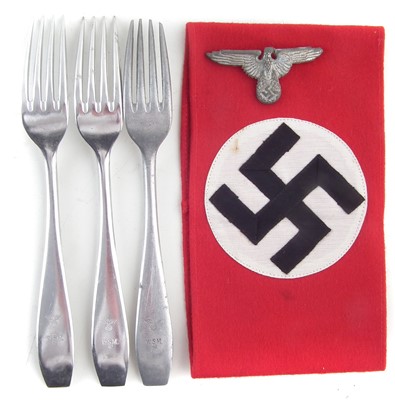 Lot 325 - Three German WWII Third Reich forks, a eagle badge and an arm band