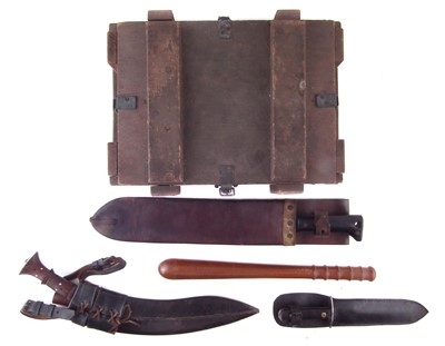 Lot 143 - Collins WWII Machete, fighting knife, Kukri, 1920s truncheon, and an ammunition box.