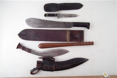 Lot 143 - Collins WWII Machete, fighting knife, Kukri, 1920s truncheon, and an ammunition box.