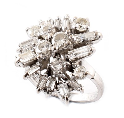 Lot 120 - Diamond staggered cluster 18ct white gold ring.