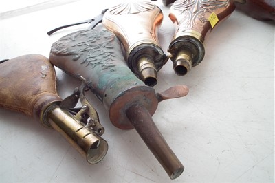 Lot 12 - Reproduction percussion coastguard pistol, three powder flasks, bullet mould and a shot flask