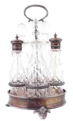 Lot 63 - A Victorian silver and glass five-piece cruet set and stand